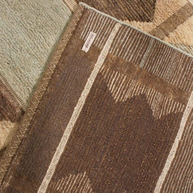 Rug and Kilim’s ScandinavianInspired Geometric Gray and Blue Wool Pile