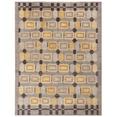 Rug 
Kilim’s Scandinavian-Inspired Geometric Gray and Gold Wool Pile Rug