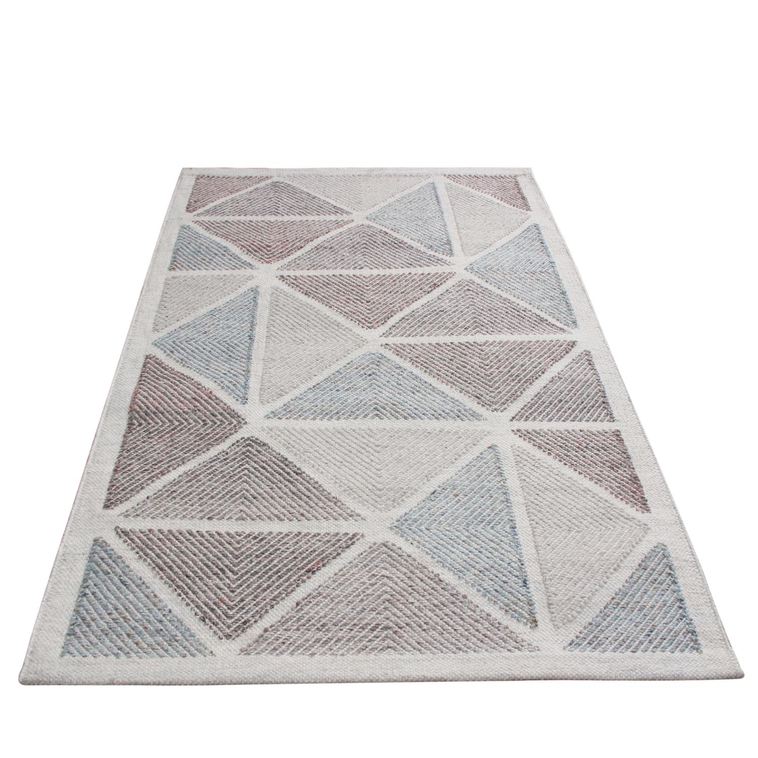 Originating from India, this natural polyester rug hails from Rug & Kilim’s Outdoor line among its Scandinavian collection, featuring designs including this chic, rippling interpretation of celebrated Moroccan diamond patterns in earth tones and