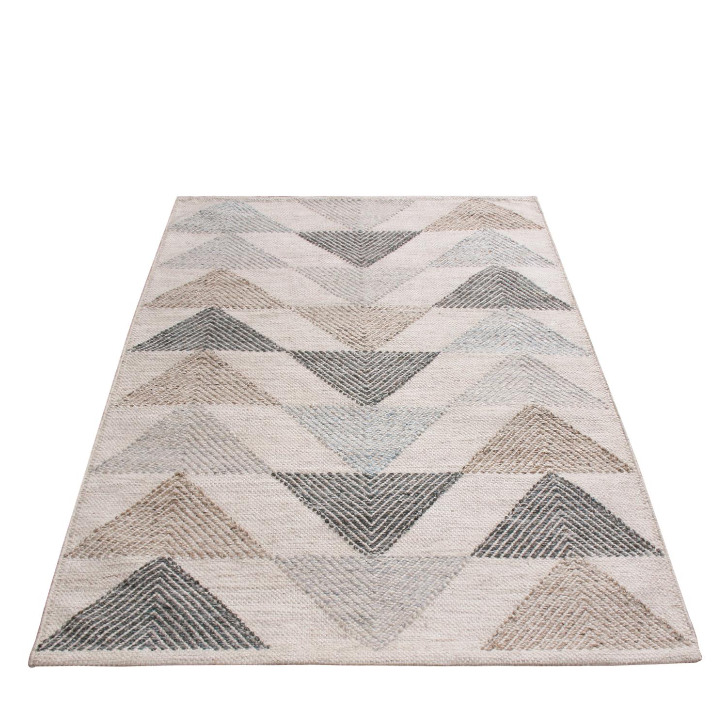Originating from India, this natural polyester rug hails from Rug & Kilim’s Outdoor Scandinavian collection, featuring designs including this chic, rippling interpretation of celebrated Moroccan diamond patterns in earth tones and multi-tonal gray