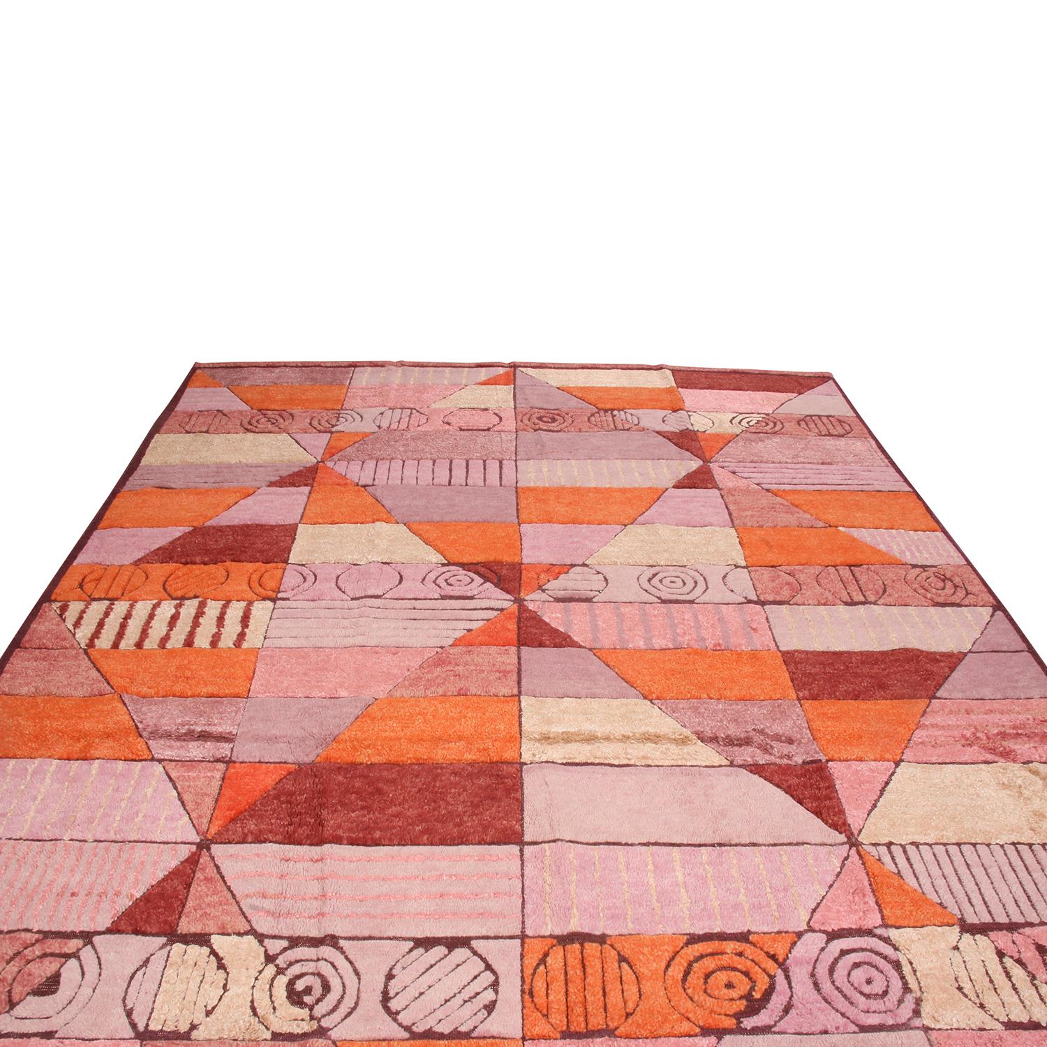 Originating from India, this geometric rug hails from Rug & Kilim’s Scandinavian-inspired collection, blending high-quality pile and flat-woven wool and an inviting mixed pile height with textures complementing the multi-tonal pink, purple, orange,