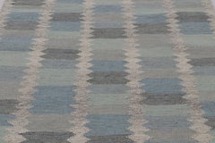 Rug & Kilim’s Scandinavian-Inspired Rug, Blue with Sawtooth Geometric Patterns