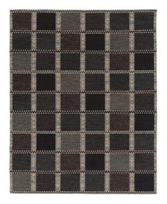Rug & Kilim’s Scandinavian-Inspired Rug, Deep Purple and Teal Geometric Patterns
