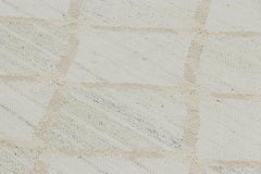 Rug & Kilim’s Scandinavian-Inspired Rug, Diamond Patterns in Ivory and Blue