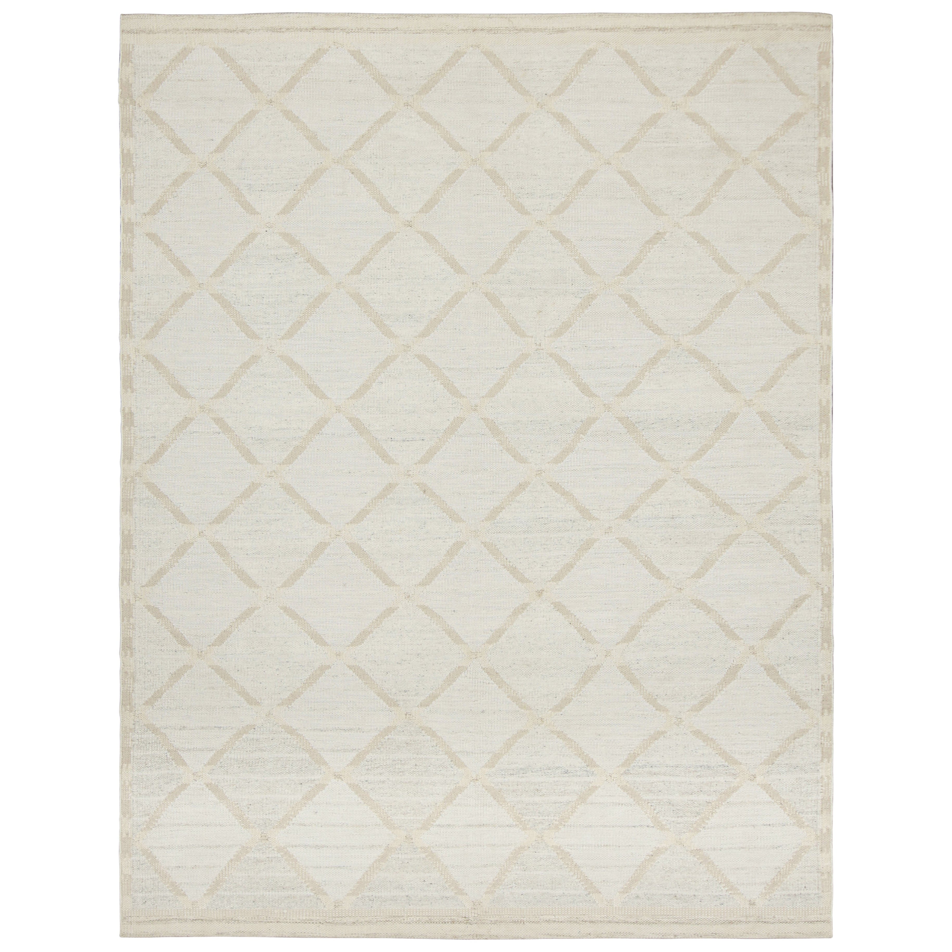 Rug & Kilim’s Scandinavian-Inspired Rug, Diamond Patterns in Ivory and Blue
