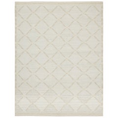 Rug & Kilim’s Scandinavian-Inspired Rug, Diamond Patterns in Ivory and Blue