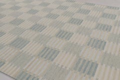Rug & Kilim’s Scandinavian-Inspired Rug, Geometric Patterns in Blue & Cream