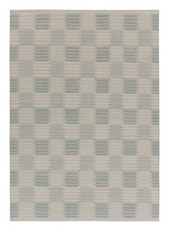 Rug & Kilim’s Scandinavian-Inspired Rug, Geometric Patterns in Blue & Cream