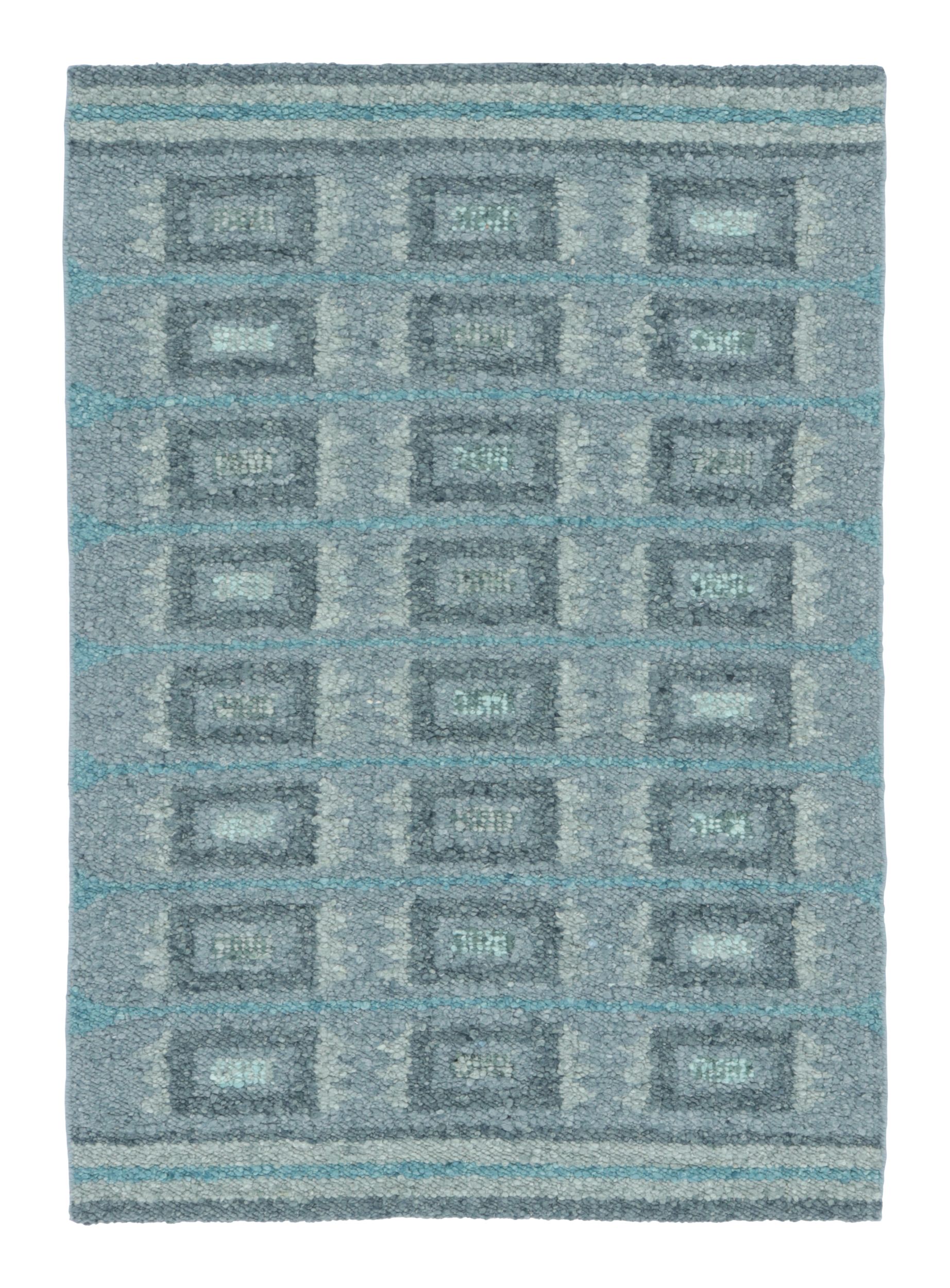 Rug & Kilim’s Scandinavian-Inspired Rug in Gray and Blue Geometric Patterns