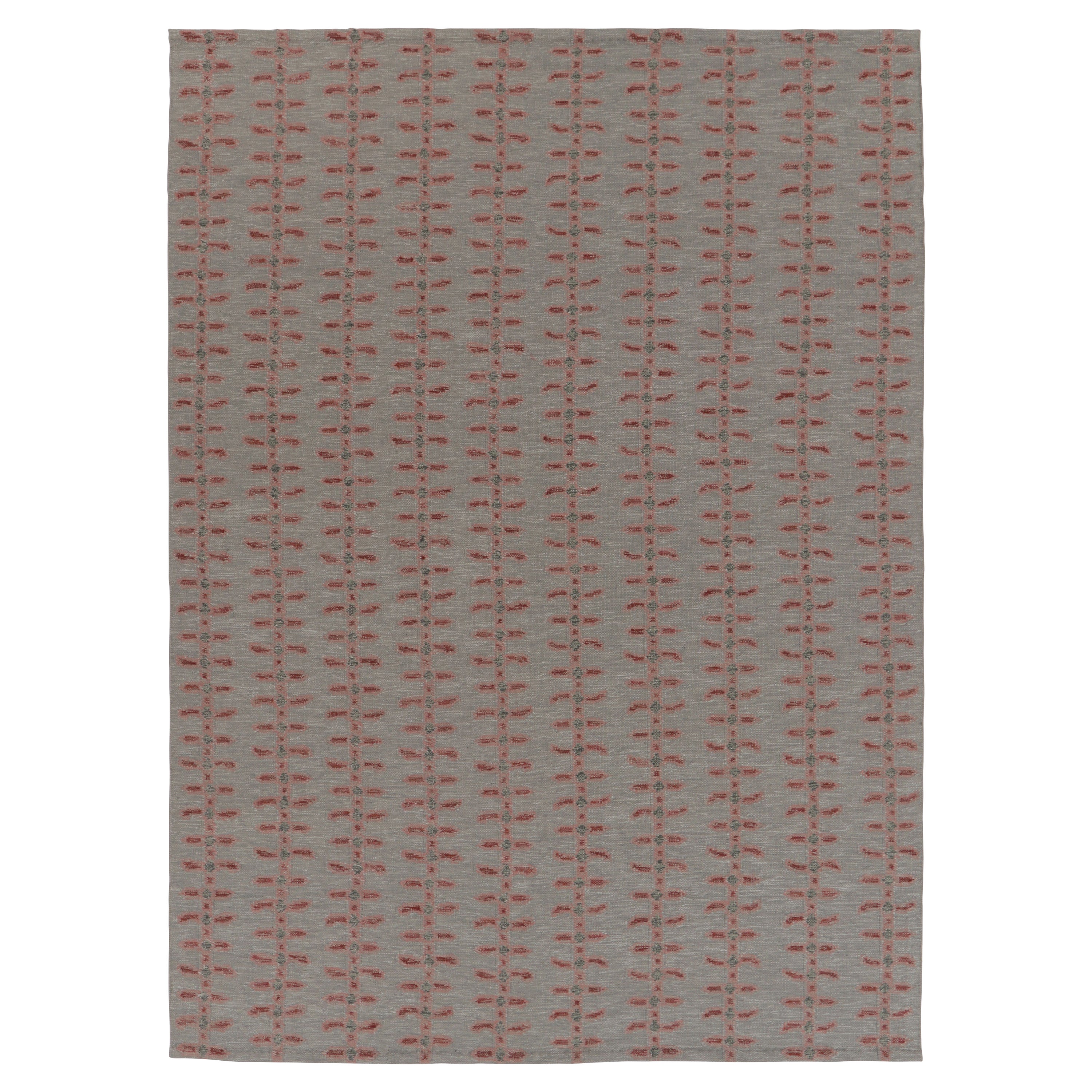 Rug
Kilim è un tappeto d
ispirazione scandinava in grigio con motivi rossi e minimalisti