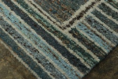 Rug & Kilim’s Scandinavian Inspired Rug in Teal Blue Geometric Grid