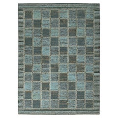 Rug 
Kilim’s Scandinavian Inspired Rug in Teal Blue Geometric Grid