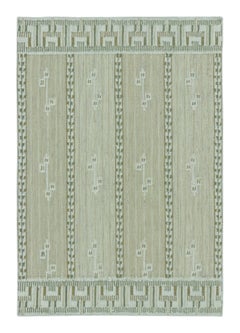Rug & Kilim’s Scandinavian-Inspired Rug, “Marta Stripe" design in Sage and Olive