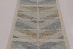 Alfombra de inspiración escandinava de Rug & Kilim, galones minimalistas en gris y azul