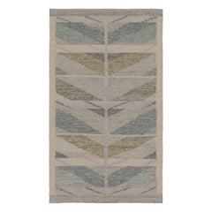 Rug 
Kilim’s Scandinavian-Inspired Rug, Minimalist Chevrons in Gray and Blue