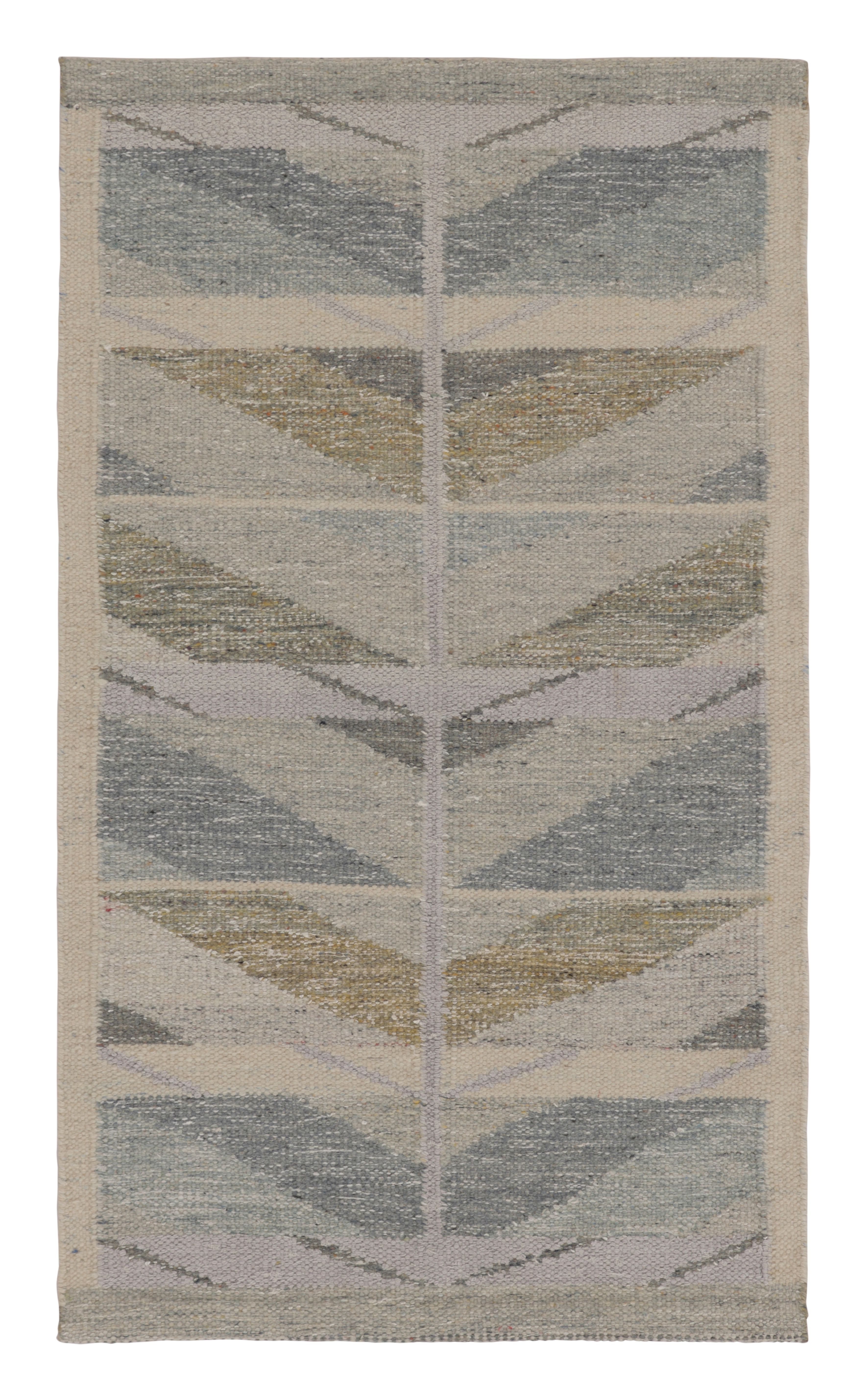 Rug & Kilim’s Scandinavian-Inspired Rug, Minimalist Chevrons in Gray and Blue