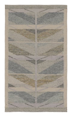 Alfombra de inspiración escandinava de Rug & Kilim, galones minimalistas en gris y azul