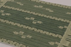 Rug & Kilim’s Scandinavian-Inspired Rug, Swedish Minimalist Geometry in Green