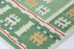Rug & Kilim’s Scandinavian-Inspired Rug with Multi-Color Geometric Patterns