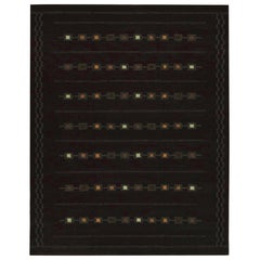Rug & Kilim’s Scandinavian Kilim Rug in Rich Aubergine, with Geometric Patterns