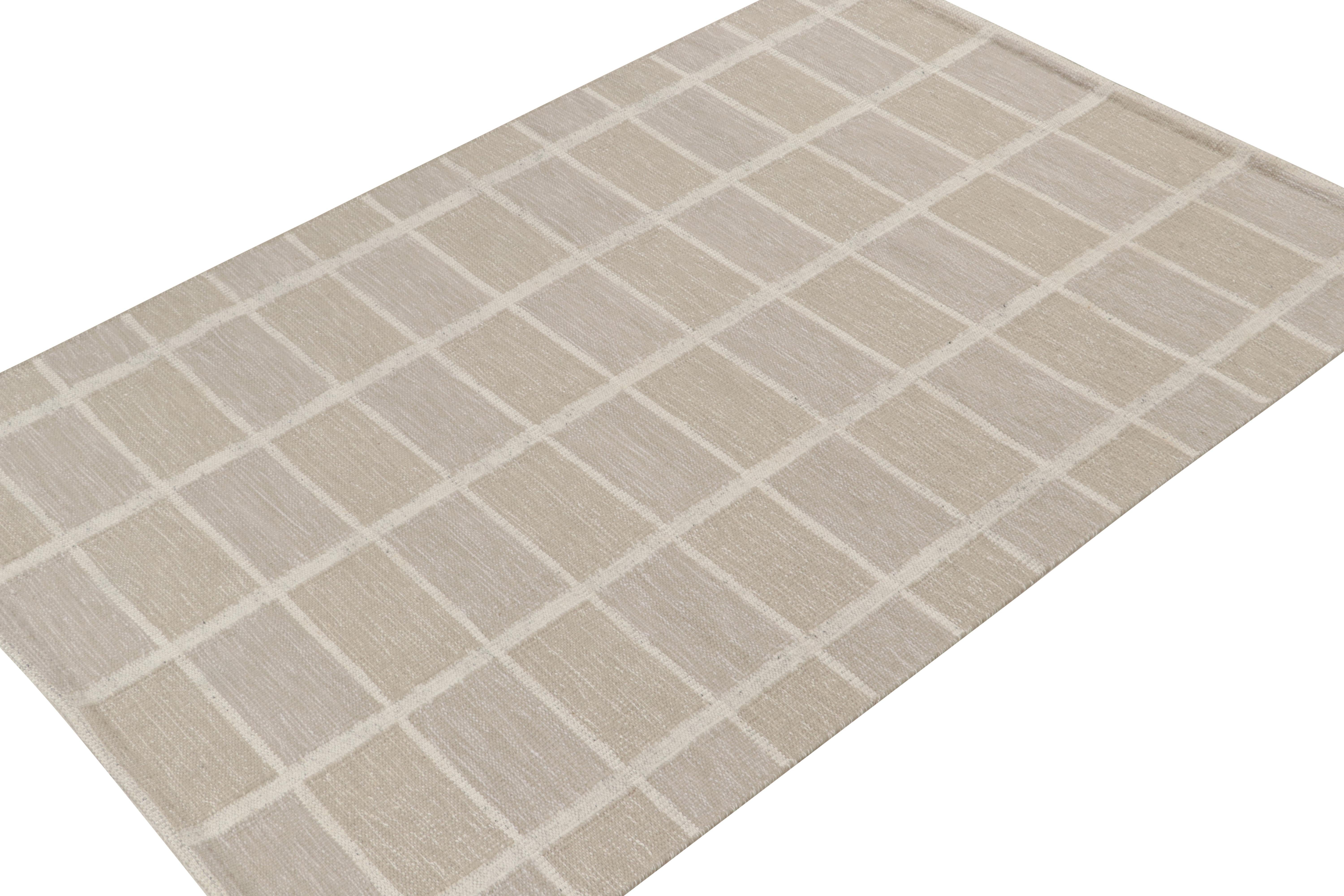 This smart 6x9 Swedish style kilim is the next addition to Rug & Kilim's award-winning Scandinavian flat weave collection. Handwoven in wool. 
Further On the Design: 
This rug enjoys geometric patterns in crisp beige and white, with taupe