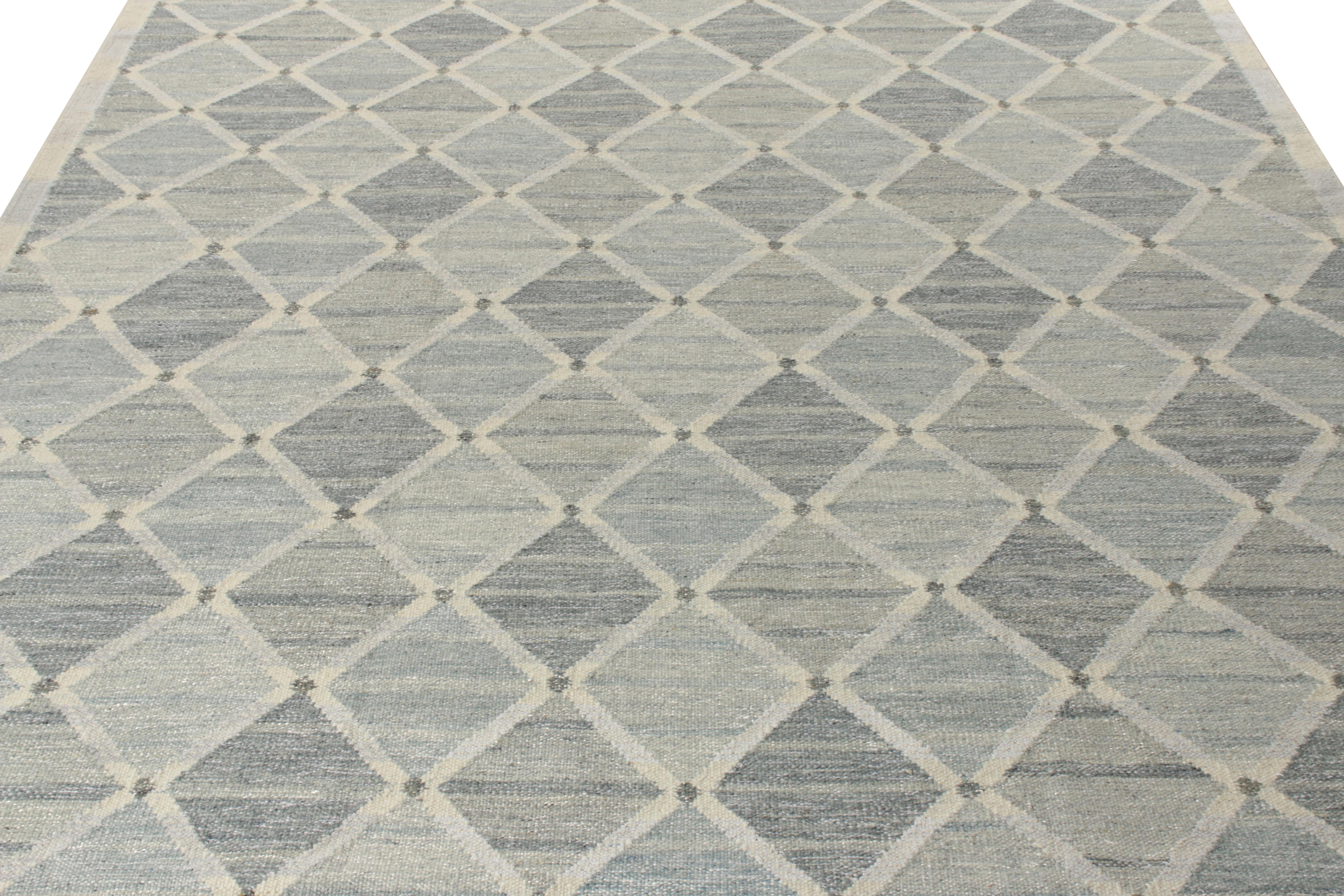 A gorgeous custom flat weave from Rug & Kilim’s Scandinavian Kilim Collection. Exemplified in this 10x14 edition, the flatweave carries a cool composure with soothing tones of blue and gray covering the scale with a classic, cozy abrashed look. The