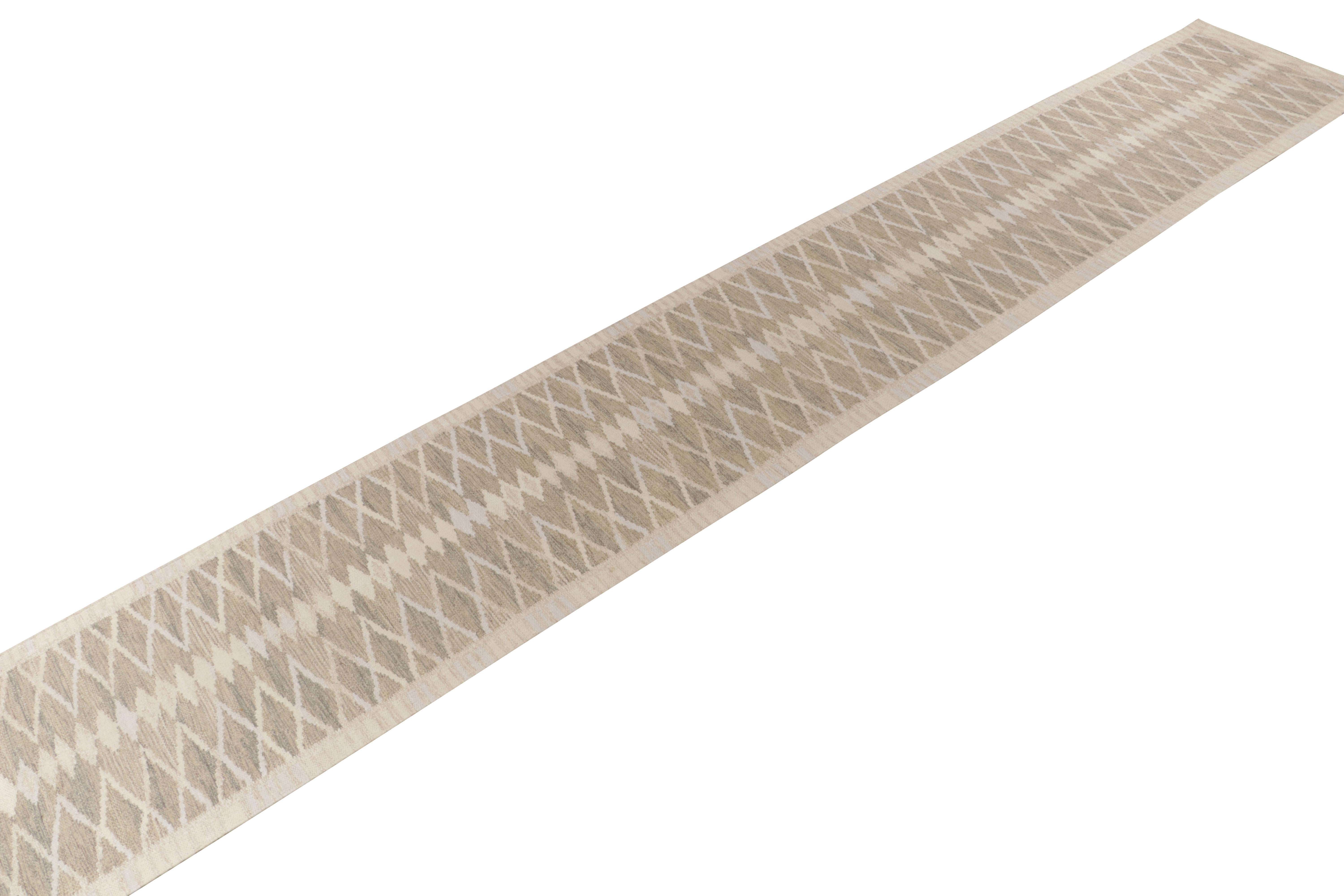 From our titular award-winning flatweave collection, a 3x32 Scandinavian style kilim runner exemplifying the mid-century modern style.

On the Design: Handwoven in wool, the crisp geometric pattern embodies the smart chic of Swedish Deco in