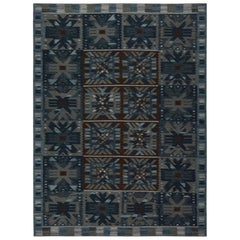 Rug & Kilim’s Scandinavian Kilim with Geometric Patterns in Dark Blue