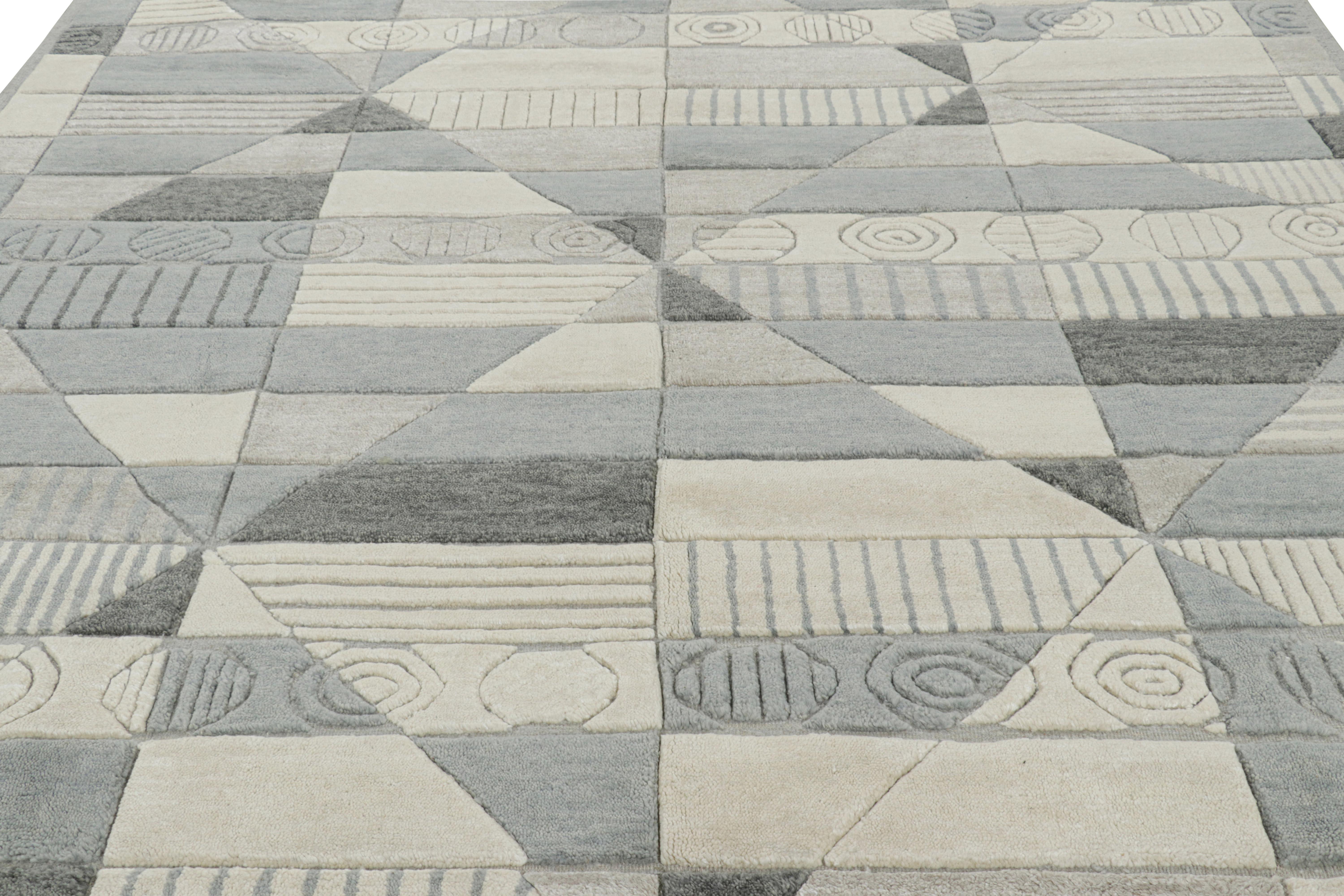 Fabriqué en laine et soie nouées à la main, ce tapis 9x12 est un nouvel ajout à la collection de tapis scandinaves de Rug & Kilim - une réimagination contemporaine du minimalisme suédois et des tapis et textiles vintage des traditions Rollakan et