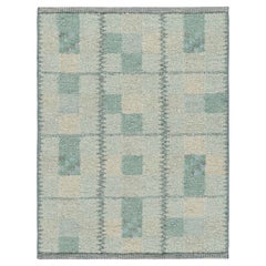 Rug & Kilim’s Scandinavian Rug in Seafoam Green and Teal Blue Geometric Patterns