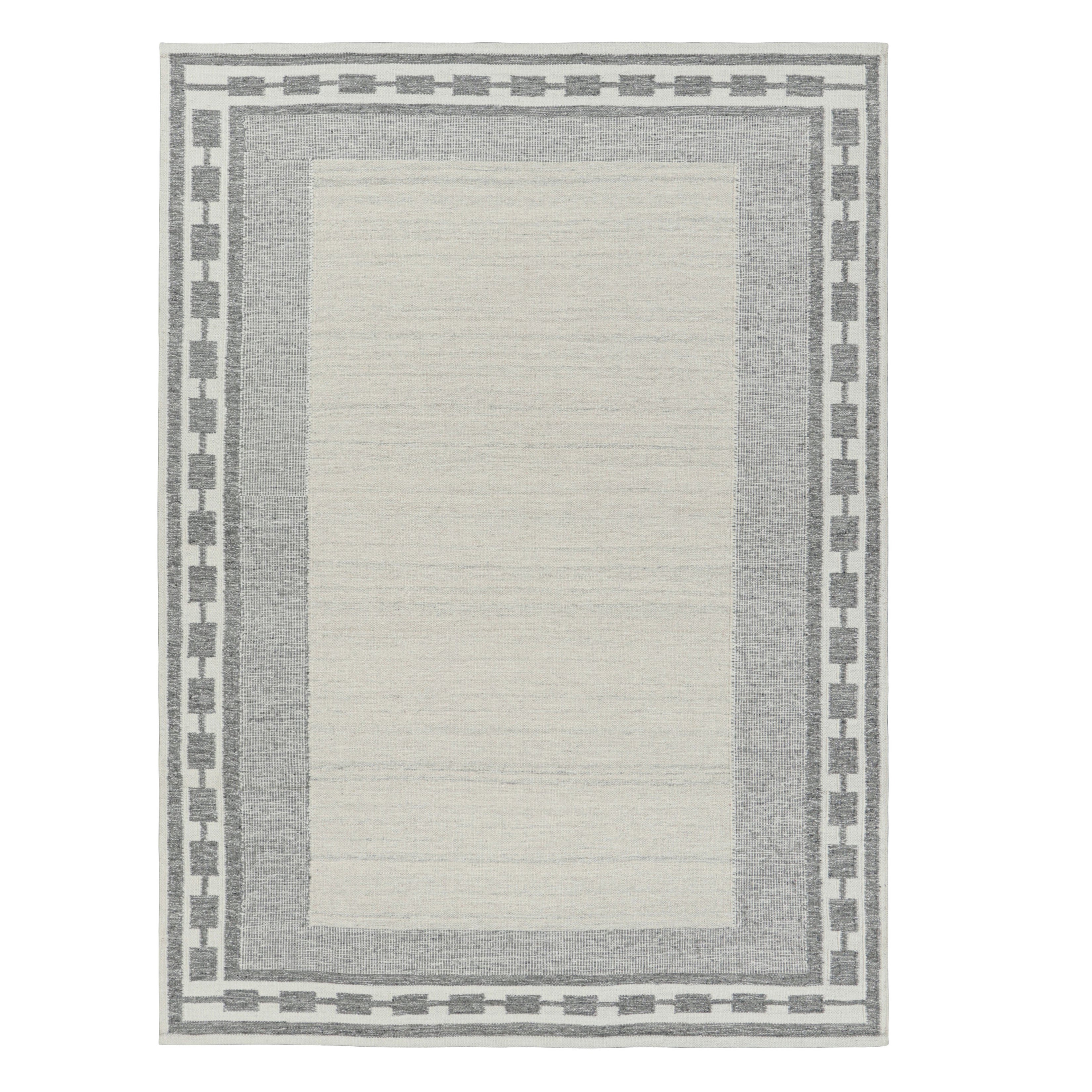 Alfombra escandinava Rug 
Kilim en blanco campo abierto, bordes geométricos grises en venta