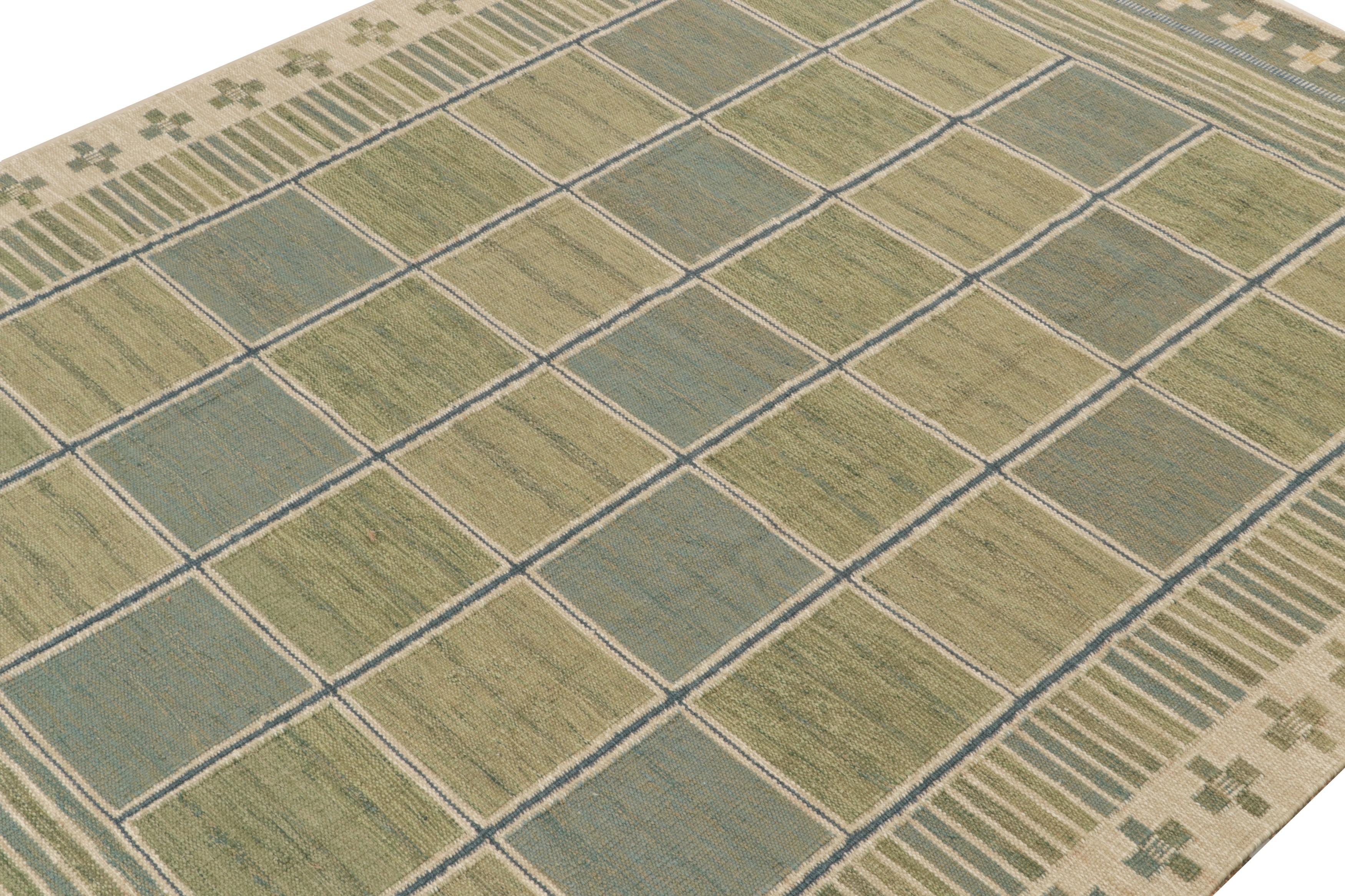 Ein erfrischendes Kelimdesign im schwedischen Stil aus unserer preisgekrönten skandinavischen Flachgewebekollektion. Handgewebt aus Wolle. 

Über das Design: 
Dieser Teppich sorgt mit seinen geometrischen Mustern in Salbeigrün-, Blau- und Beigetönen