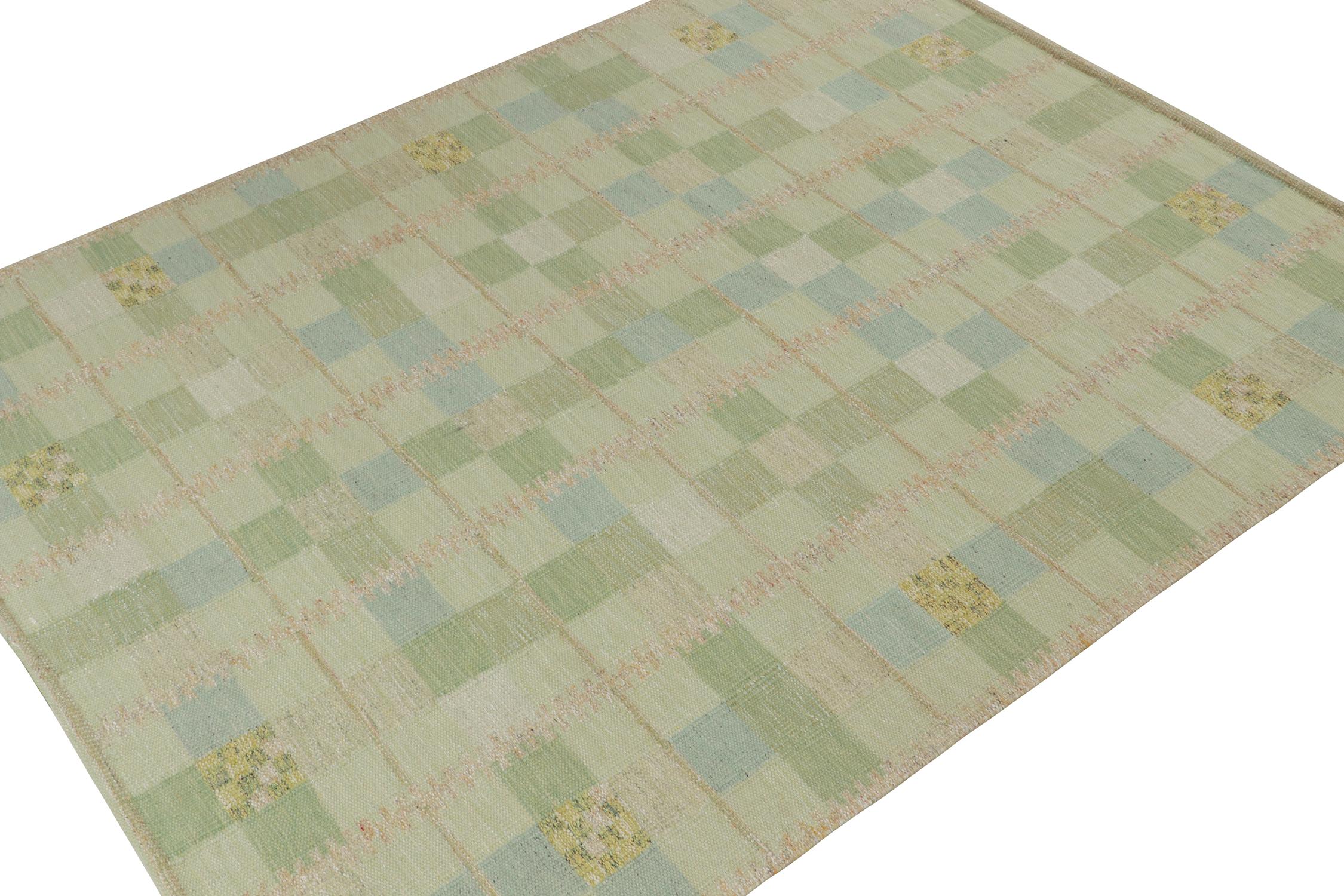 A Swedish style custom kilim design from Rug & Kilim's award-winning Scandinavian flat weave collection. Handwoven in wool. 
On the Design: 
This rug enjoys a pleasing and gentle movement with geometric patterns in the most refreshing green, blue,