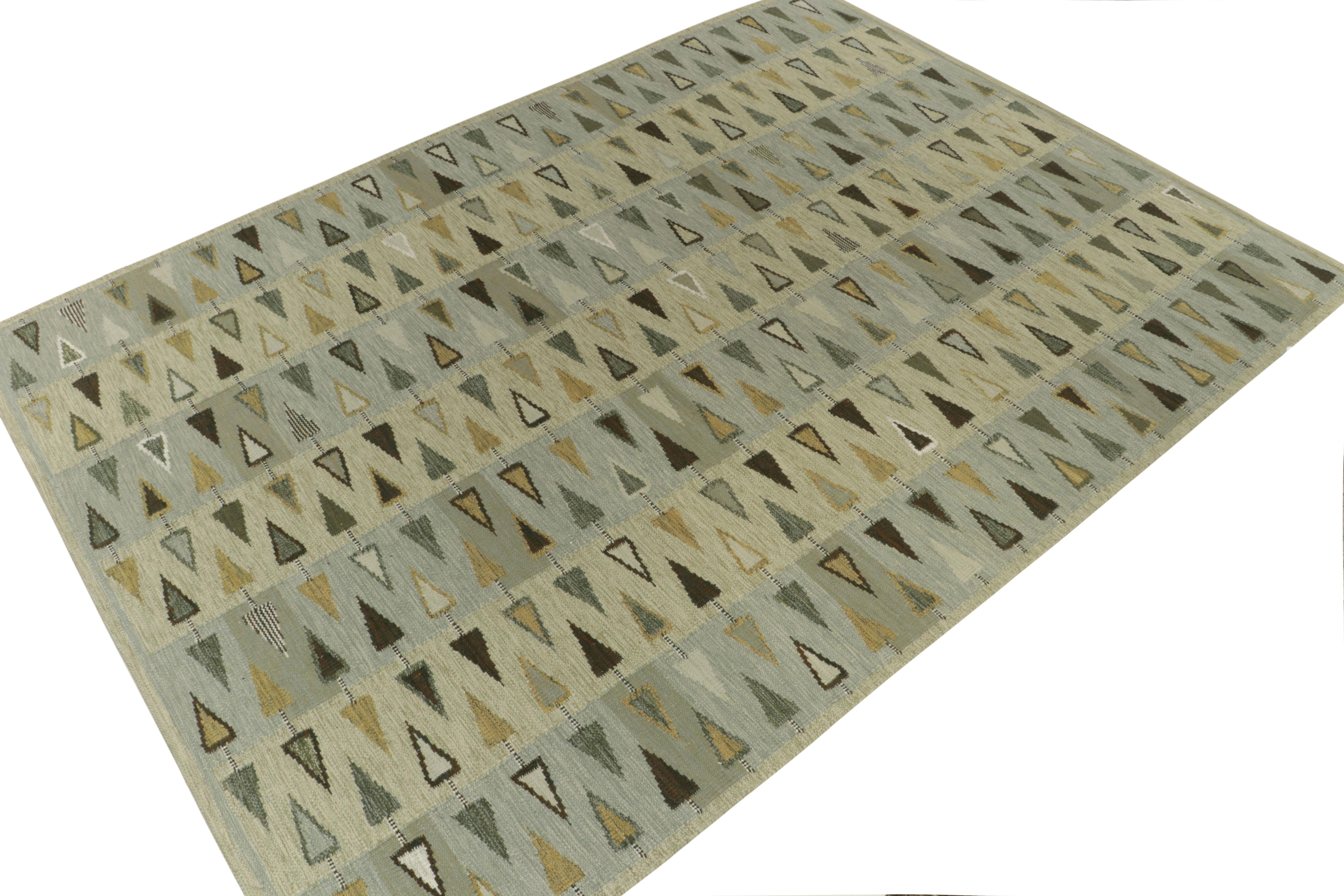 Reimagining Swedish sensibilities, this Scandinavian Kilim design enjoys a defined geometric pattern in gorgeous movement, exemplified in rich play of gold & gray tones alternating graciously for lavish take in contemporary style. Further enjoying
