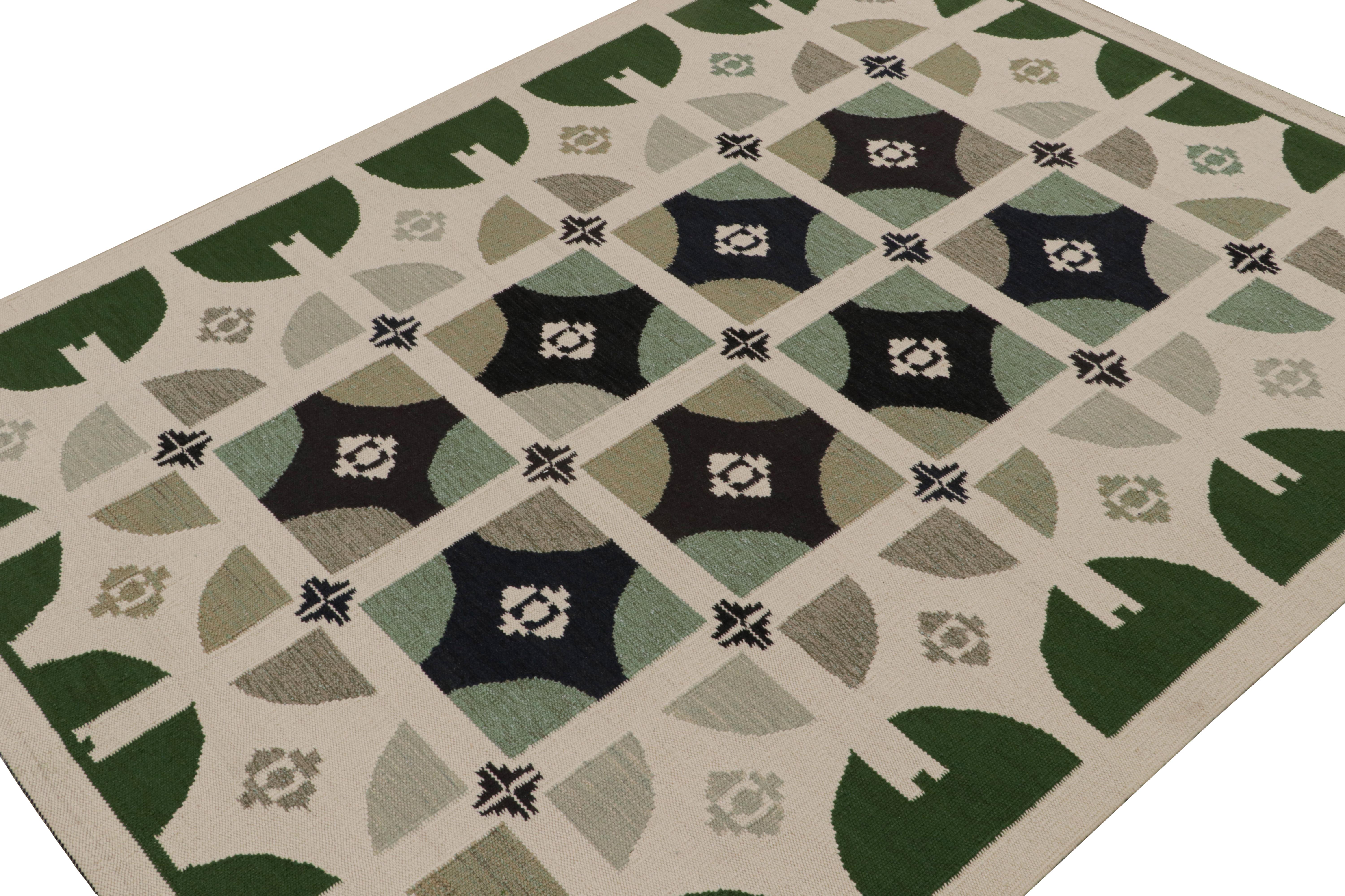 A 9x12 Swedish style custom kilim from our award-winning Scandinavian flat weave collection. Handwoven in wool, cotton & undyed natural yarns

On the Design: 

This rug enjoys geometric patterns in green, white & black. Keen eyes will admire undyed,