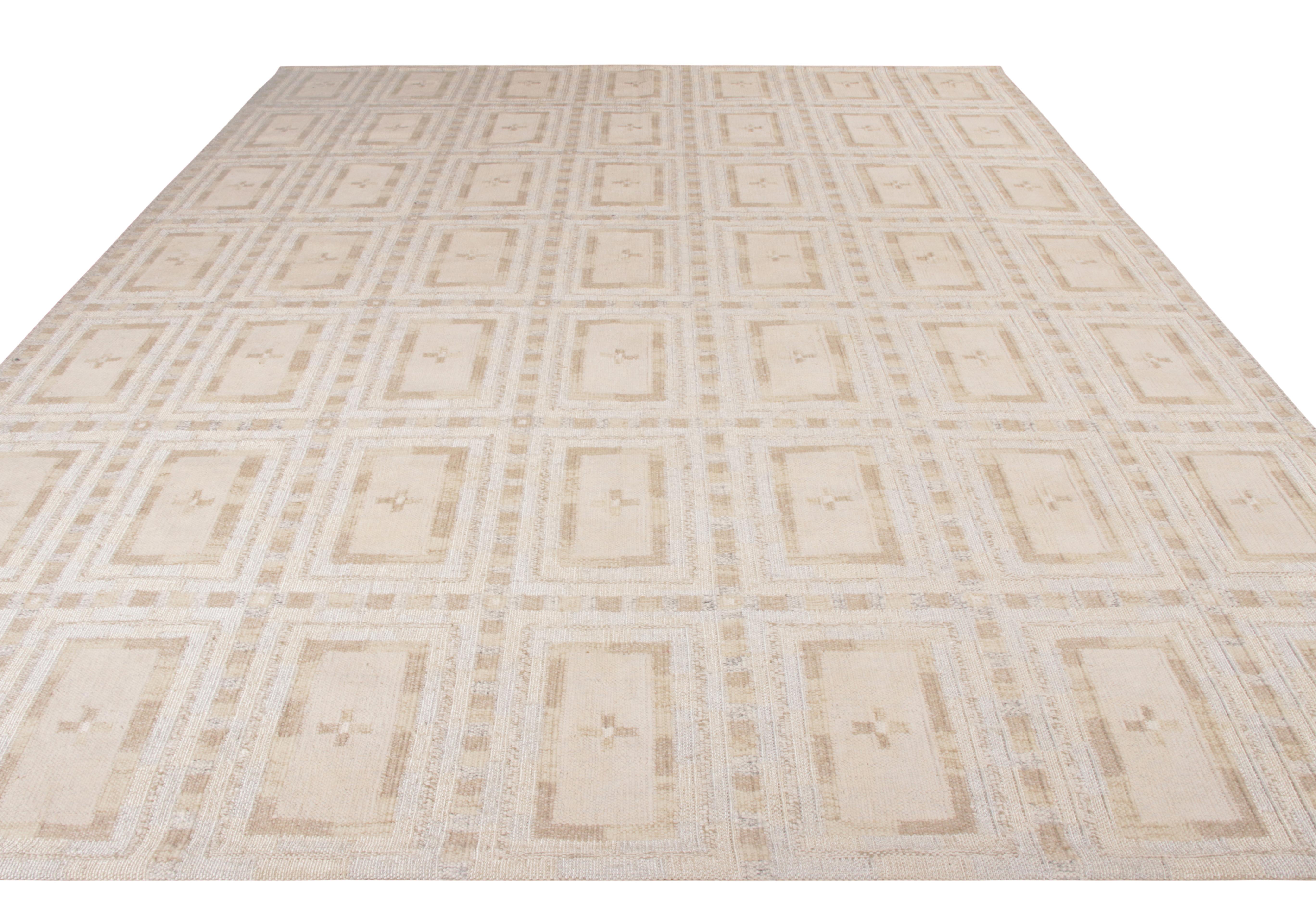A custom Kilim rug from the acclaimed Scandinavian Collection by Rug & Kilim. Handwoven in wool and natural yarns, exemplified in this all over geometric pattern of beige-brown with crisp white and blue accents. Further enjoying a durable body more