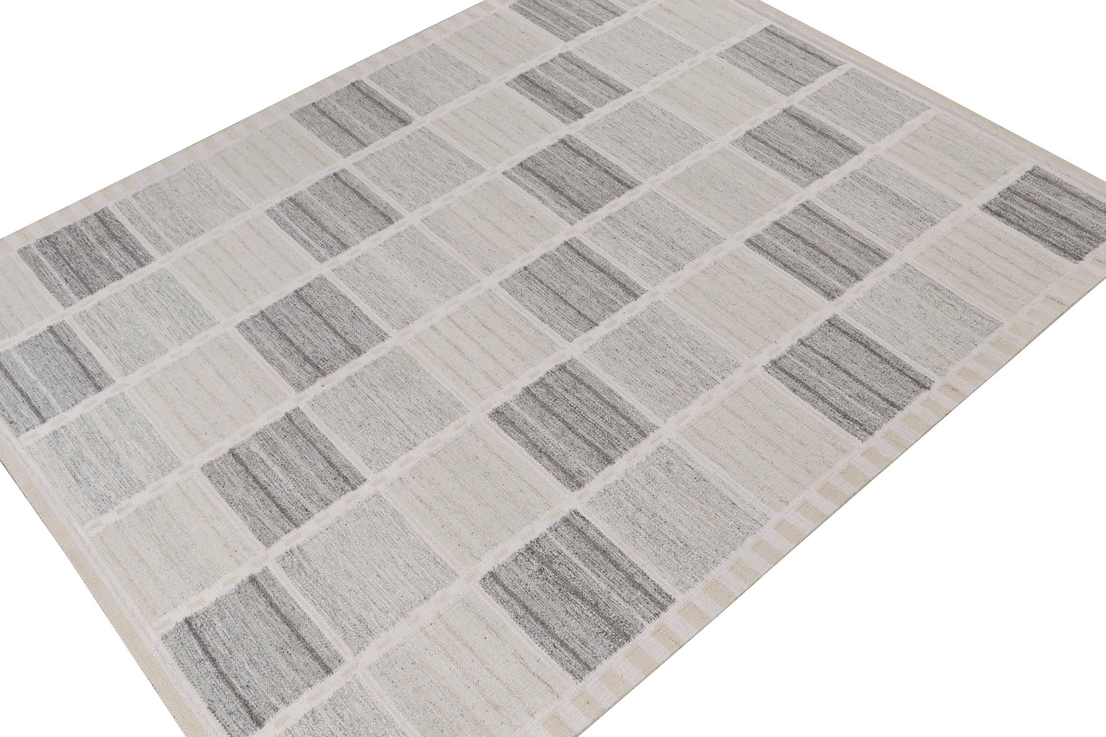 This Swedish style custom kilim design is new to Rug & Kilim's award-winning Scandinavian flat weave collection. Handwoven in wool. 
Further on the design: 
This rug enjoys a pleasing sense of movement with crisp greige colors born of white, gray,
