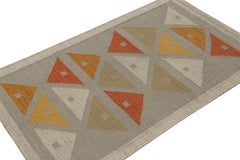 Rug & Kilim’s Scandinavian Style Custom Kilim rug in Grey & Orange Patterns