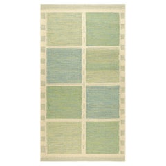 Alfombra personalizada de estilo escandinavo de Rug & Kilim en azul con motivos geométricos