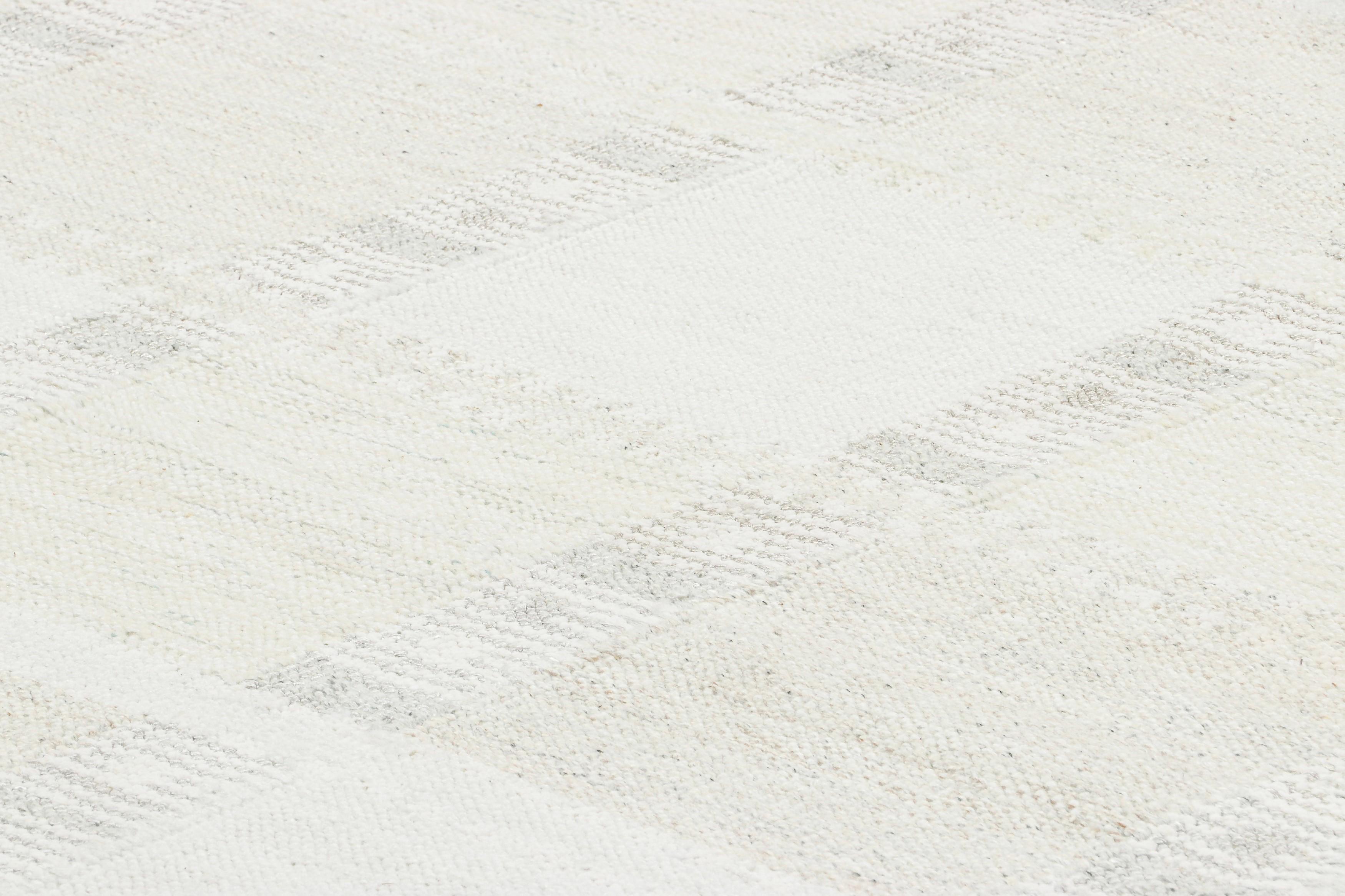 Made with handwoven wool, this 9x14 custom rug design is an exciting new addition to Rug & Kilim’s Scandinavian rug collection—a contemporary reimagining of Swedish minimalism and vintage rugs and textiles of Rollakan and Rya traditions.

On the