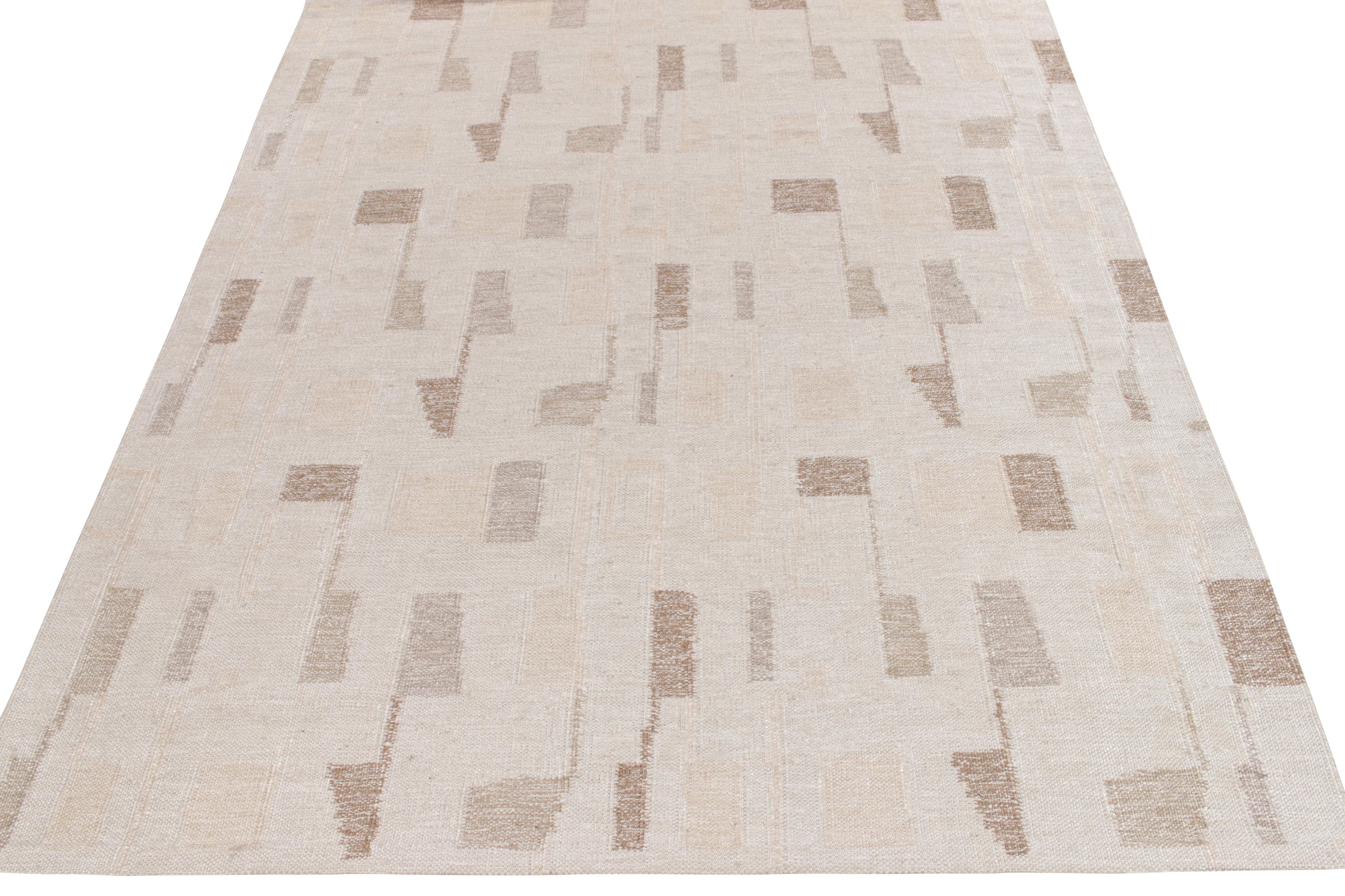 Handwoven in banana silk, Rug & Kilim presents an 8x10 Swedish flat weave inspiration from their award-winning Scandinavian Collection with a texture second to none, enjoying a geometric pattern resembling musical notes in a muted colorway of beige,