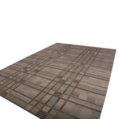 Rug & Kilim è un kilim di lana geometrico in stile scandinavo, di colore beige-marrone, grigio e blu.