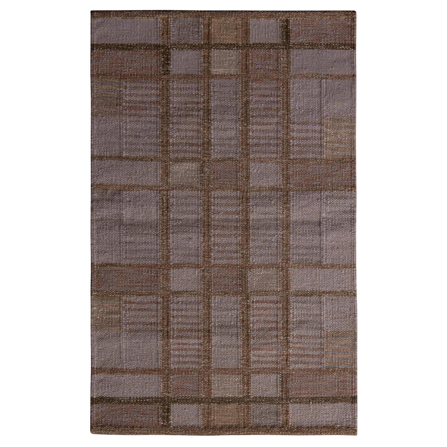 Rug
Kilim è un kilim di lana geometrico in stile scandinavo, di colore beige-marrone, grigio e blu.