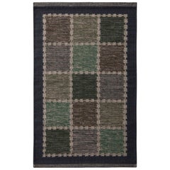 Rug 
Kilim è un kilim di lana geometrico in stile scandinavo, di colore beige-marrone, grigio e blu.