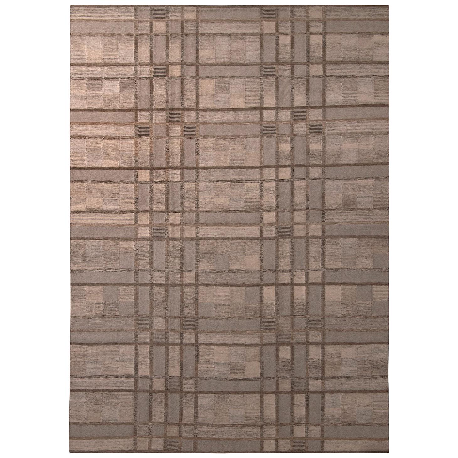 Rug 
Kilim è un kilim di lana geometrico in stile scandinavo, di colore beige-marrone, grigio e blu.