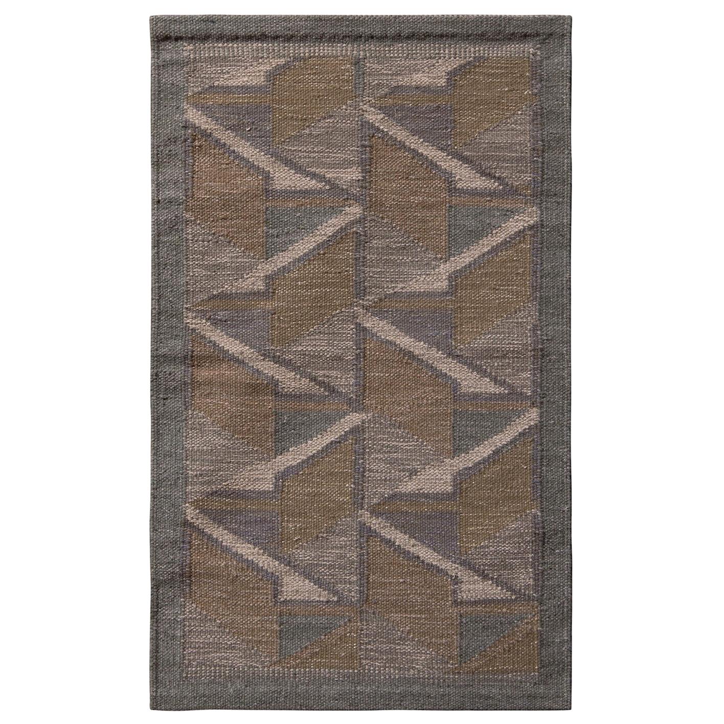 Rug 
Kilim è un kilim di lana in stile scandinavo, beige, grigio e blu.
