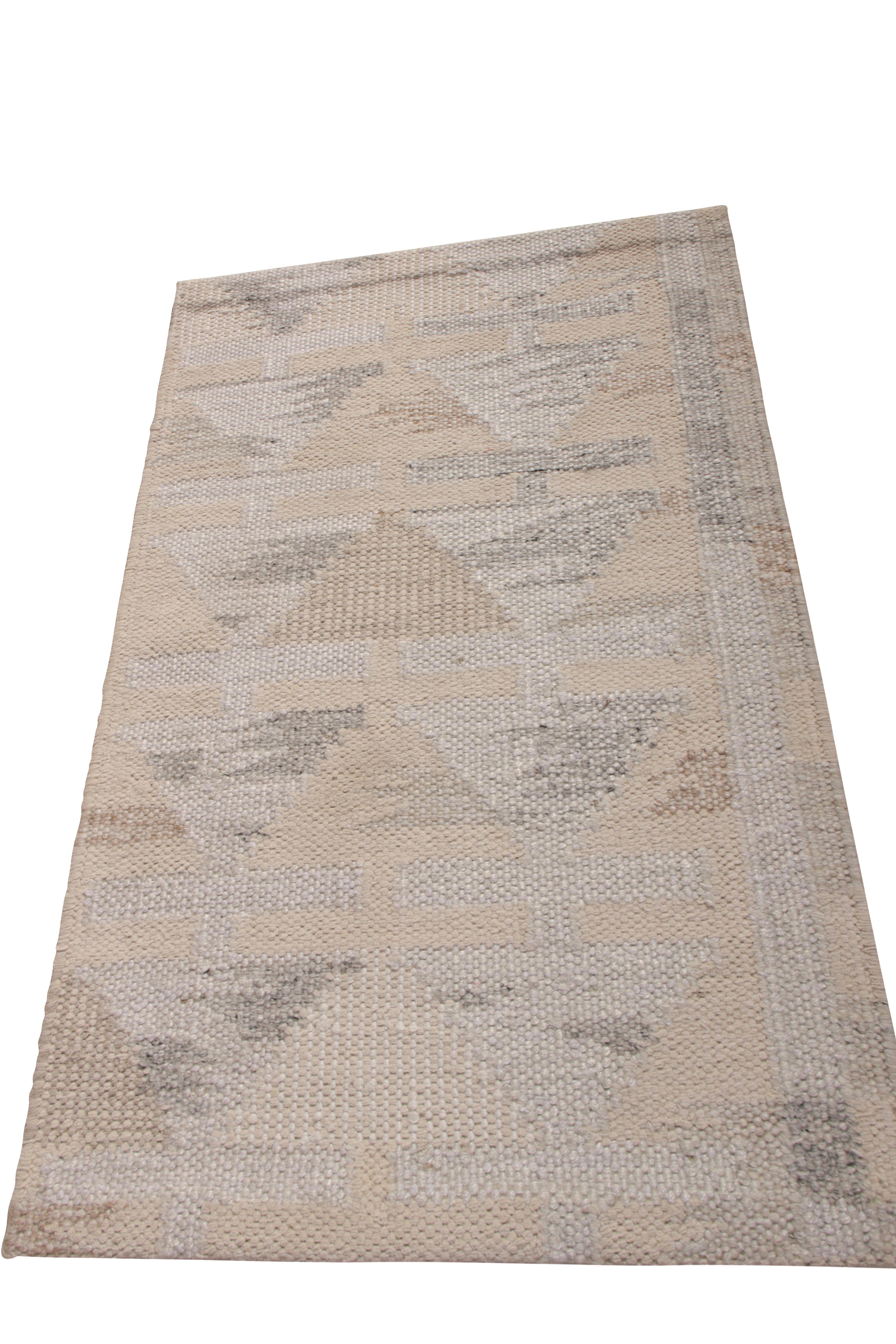 This 2x3 Kilim hails from the gift-size selections of Rug & Kilim’s Scandinavian Collection, remarking a bold take on Swedish Deco styles. This flat weave enjoys crisp white accents in a cool silver-gray colorway with beige-brown geometric patterns.