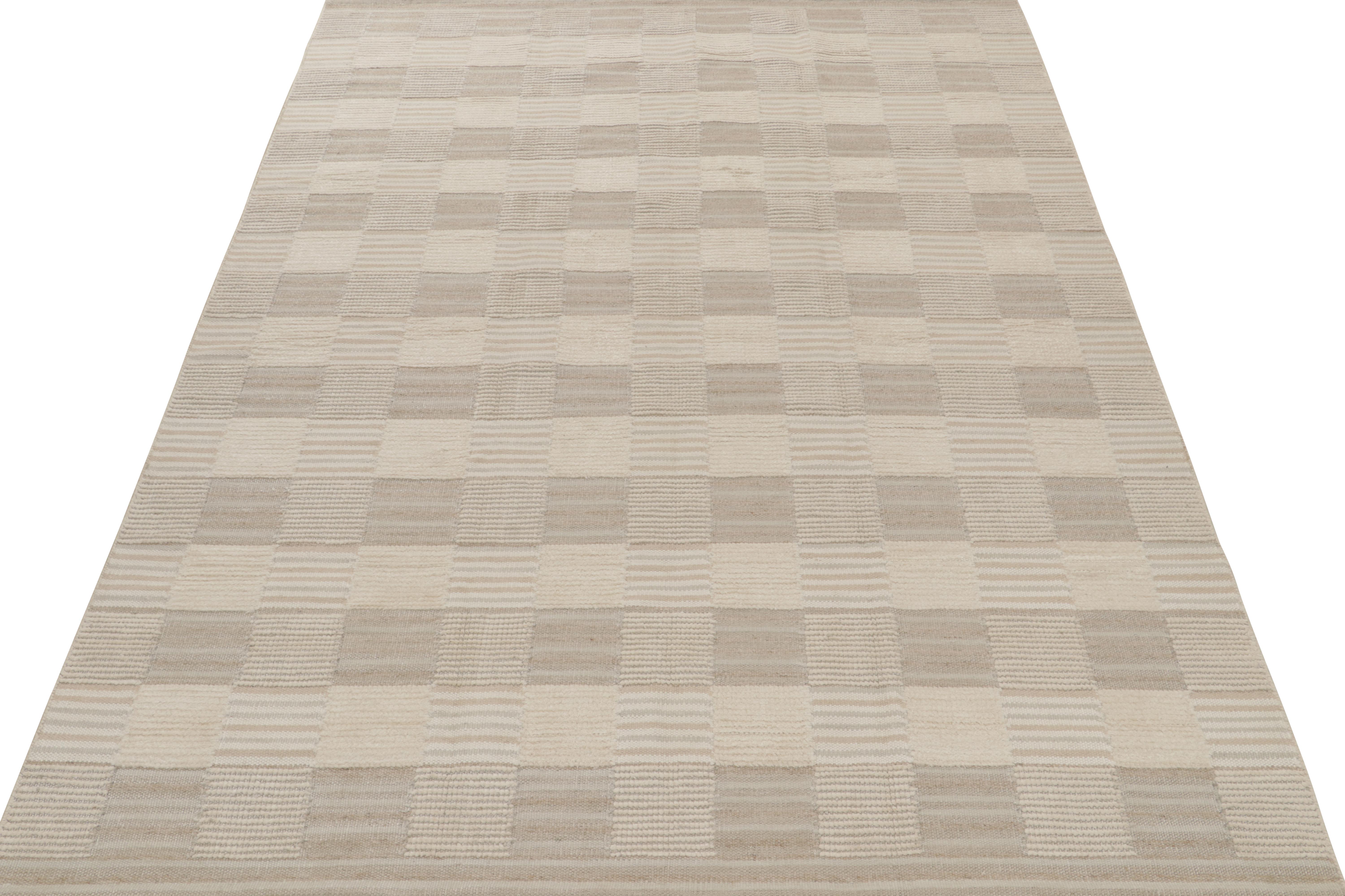Handgewebter Wollteppich, ein elegantes Kelimdesign im schwedischen Stil aus unserer preisgekrönten skandinavischen Flachgewebekollektion. 

Dieser 9x12 große Teppich zeichnet sich durch eine subtile Hoch-Tief-Struktur in Verbindung mit