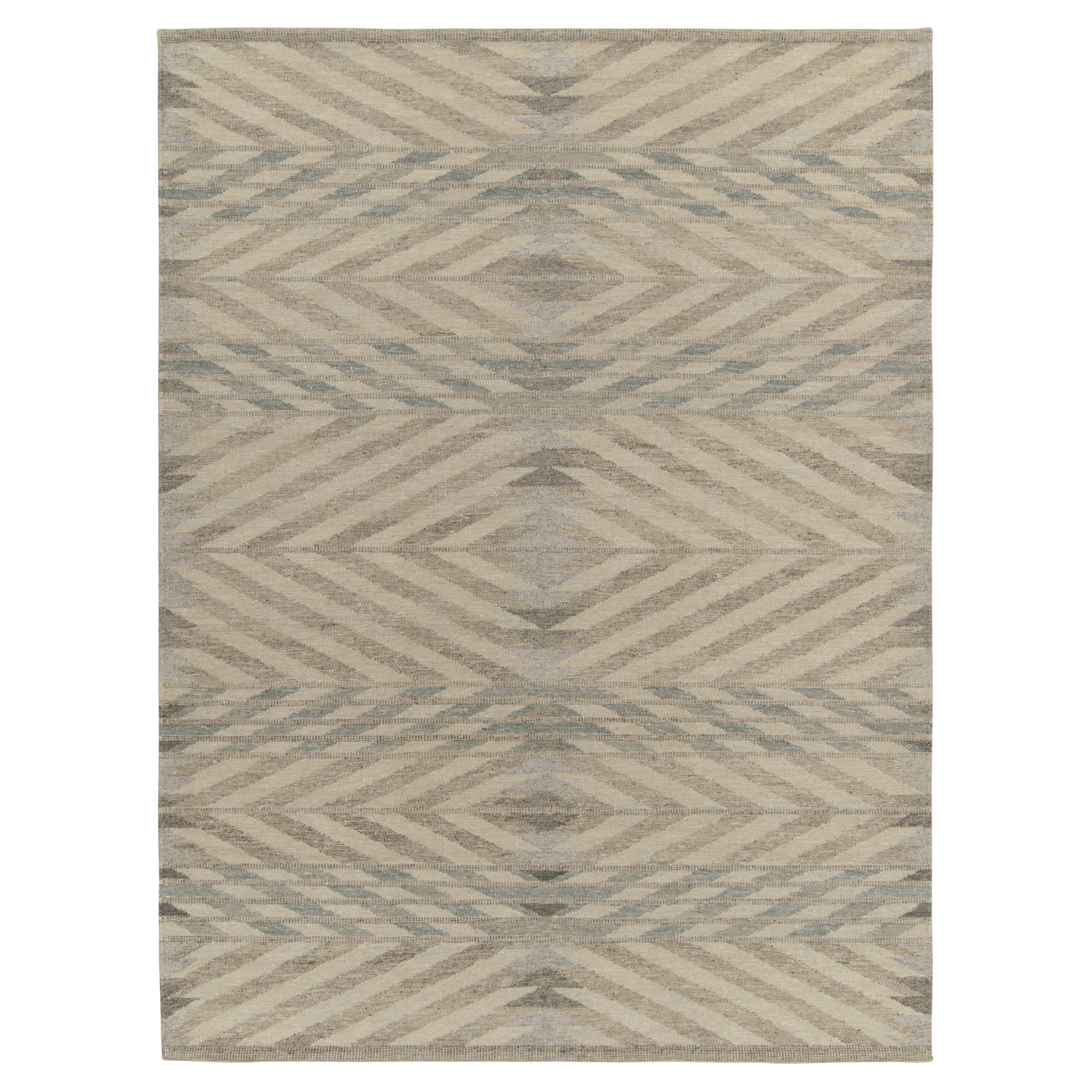 Rug & Kilim è un kilim in stile scandinavo in beige-marrone e blu chevrons.