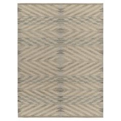 Rug & Kilim è un kilim in stile scandinavo in beige-marrone e blu chevrons.